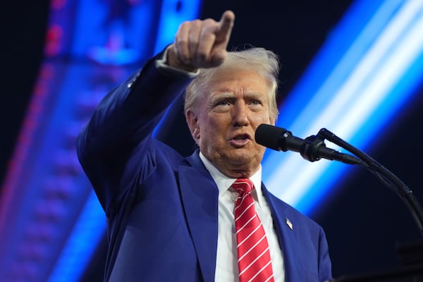 President-elect Donald Trump speaks at AmericaFest, Sunday, Dec. 22, 2024, in Phoenix. (AP Photo/Rick Scuteri)