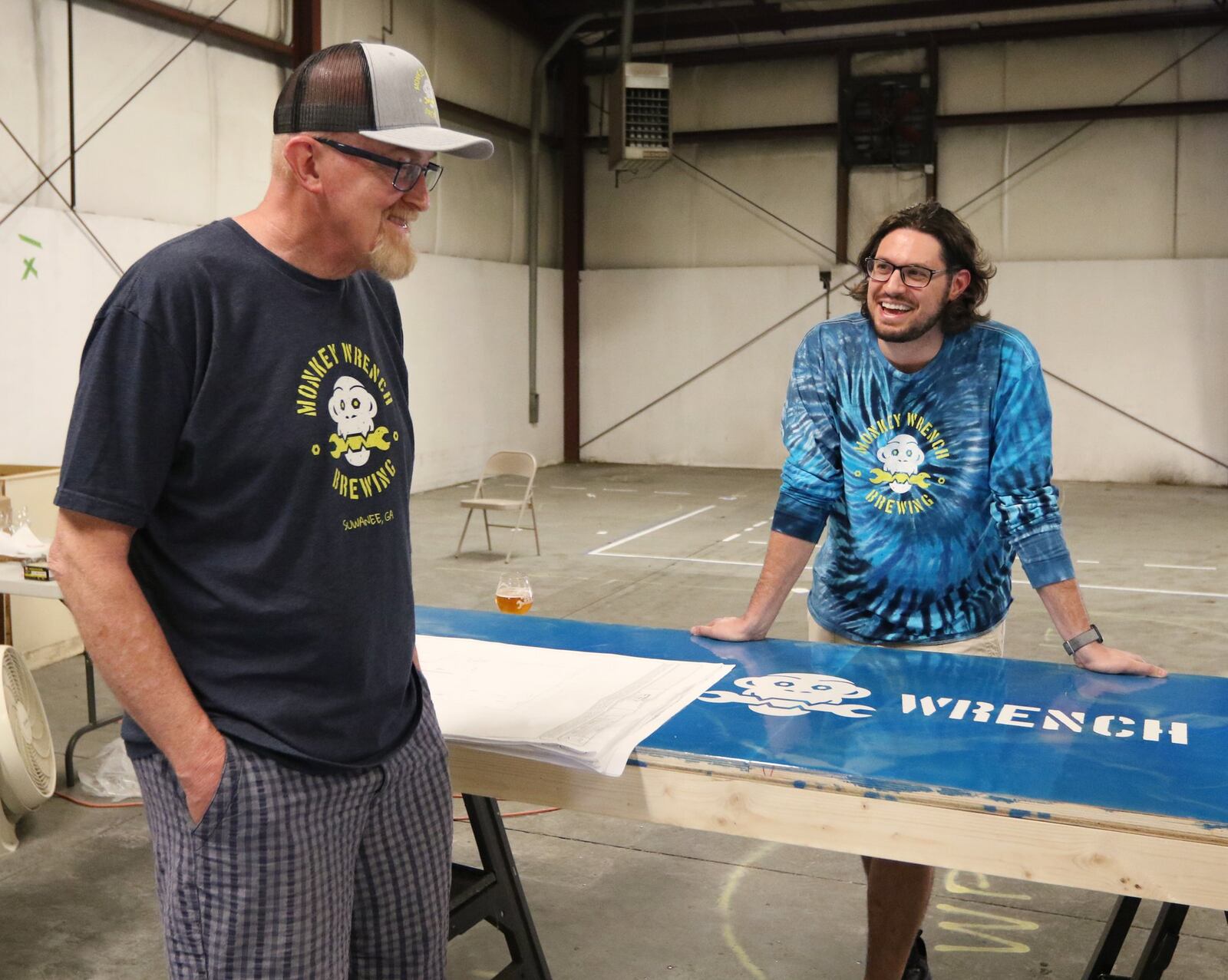 4/19/19 - Suwanee - Wayne Baxter, founder and brewmaster, (left) and Joe Dreher, creative & marketing, in their new building space at Monkey Wrench Brewing in Suwanee, Georgia on Wednesday, April 17, 2019. EMILY HANEY / emily.haney@ajc.com