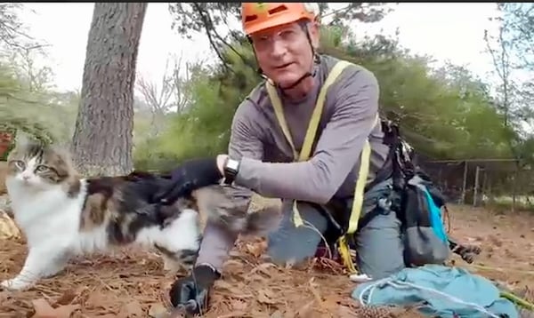 One owner of a rescued feline called Normer Adams a “cat whisperer.” Photo courtesy of Normer Adams