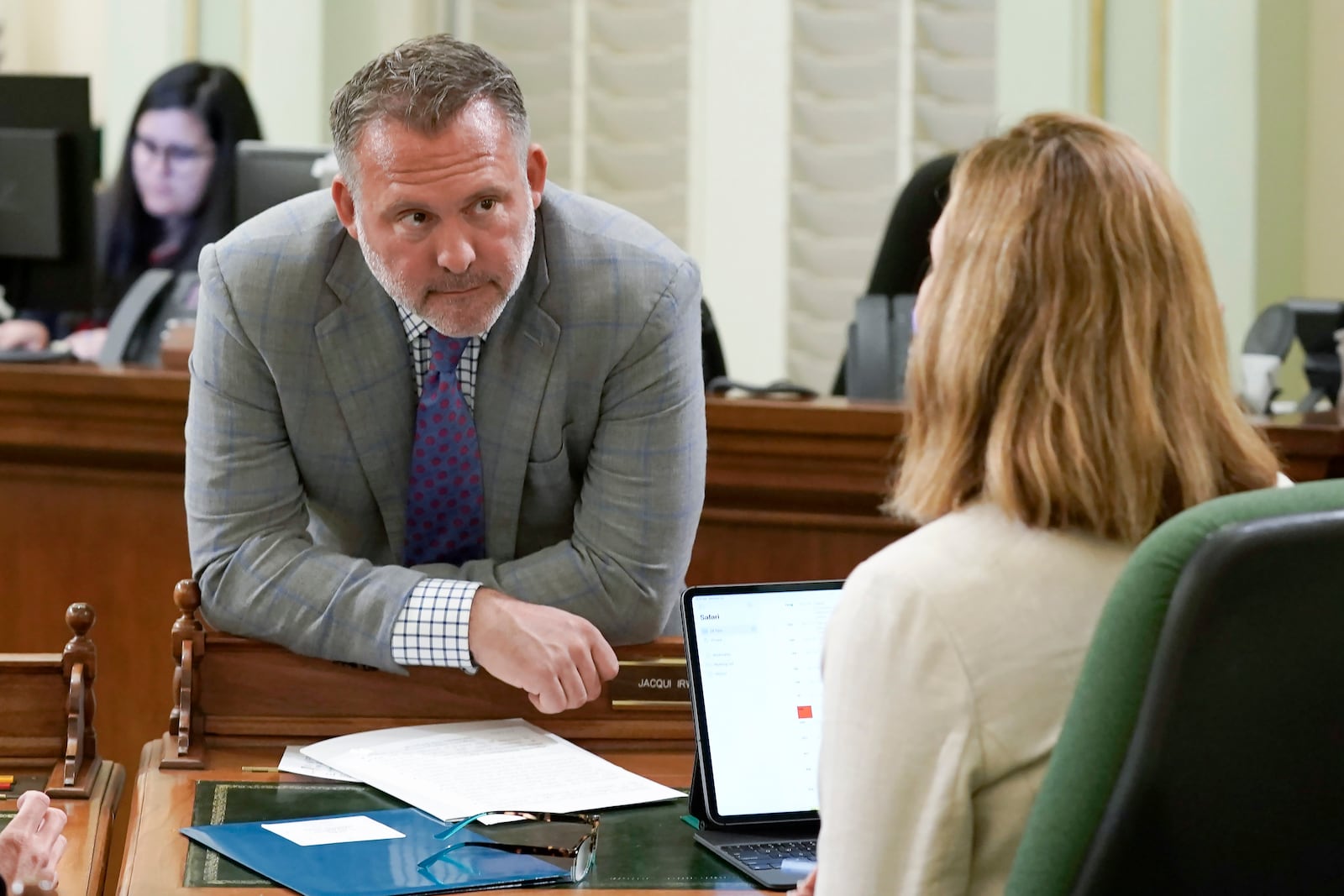 FILE - Democratic Assembly members, Adam Gray and Jacqui Irwin, of Thousand Oaks, discuss legislation at the Capitol in Sacramento, Calif., Wednesday, May 25, 2022. Gray is a candidate in California's 13th Congressional District. (AP Photo/Rich Pedroncelli, File)