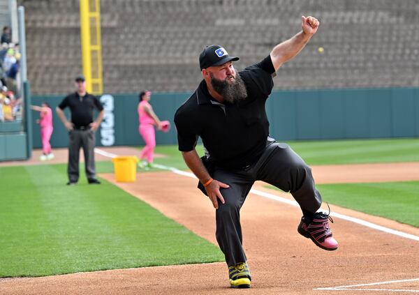 A dance umpire performs during pregame ceremony before first of three-game series at Coolray Field, Saturday, March 23, 2024, in Lawrenceville. The Savannah Bananas’ visit is their first to the Atlanta area since their founding in 2016. The team is based in their namesake Georgia city and plays 30-plus games a year at Historic Grayson Stadium, a century-old ballpark on Savannah’s eastside. (Hyosub Shin / Hyosub.Shin@ajc.com)