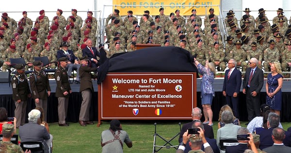 On May 11, 2023, the children of Lt. Gen. Hal and Julia Moore joined the command team at what was known as Fort Benning to unveil the new sign for Fort Moore. 