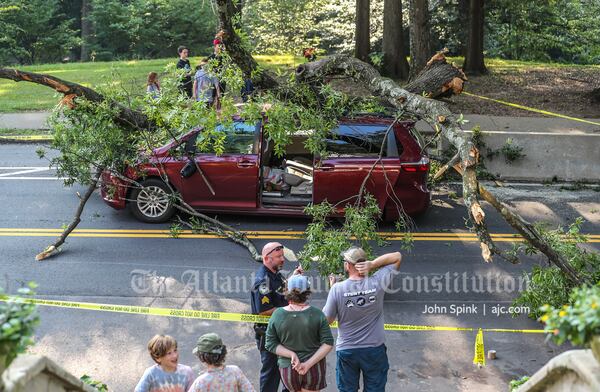 No one was injured when the tree fell Friday morning. The family of five and a 12-year-old friend were all headed to Columbus to go whitewater rafting.