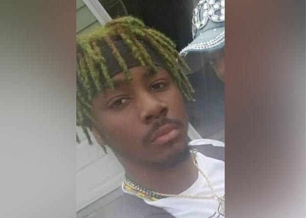 Michael Ezzard Jr., 22, was shot and killed outside a Smyrna shopping center in the 1600 block of Roswell Street.