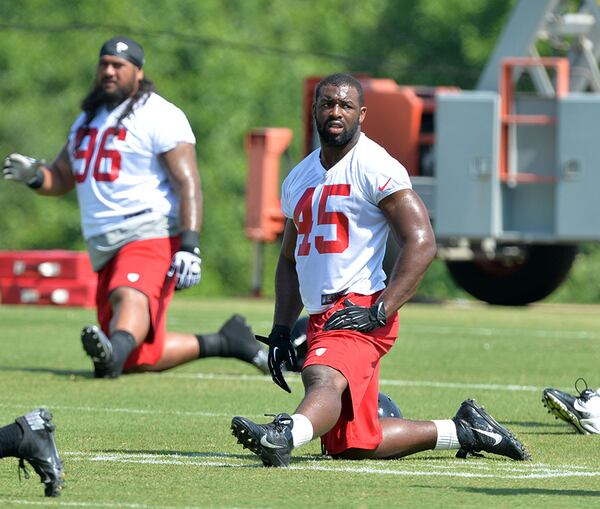 MAY 28, 2014 FLOWERY BRANCH Falcons linebacker Jacques Smith (#45) stretches during Atlanta Falcons training camp in Flowery Branch, Wednesday, May 28, 2014. KENT D. JOHNSON/KDJOHNSON@AJC.COM Falcons linebacker Jacques Smith (#45) stretches during Atlanta Falcons training camp in Flowery Branch, Wednesday, May 28, 2014. KENT D. JOHNSON/KDJOHNSON@AJC.COM