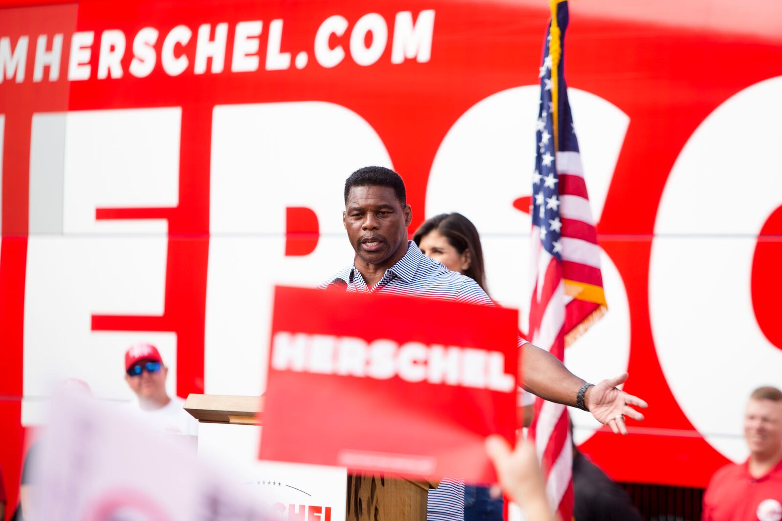 Senate candidate Herschel Walker speaks during a United Georgia Bus Stop Rally on Sunday, November 6, 2022, in Hiram Georgia. Walker predicted he will win outright on Tuesday in his race against Democratic U.S. Sen. Raphael Warnock. “Democrats want to talk about pronouns?” Walker said. “I’ll tell you what: Raphael Warnock’s new pronoun is ‘former senator.’ ” CHRISTINA MATACOTTA FOR THE ATLANTA JOURNAL-CONSTITUTION.