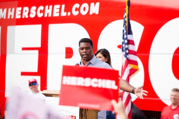 Senate candidate Herschel Walker speaks during a United Georgia Bus Stop Rally on Sunday, November 6, 2022, in Hiram Georgia. Walker predicted he will win outright on Tuesday in his race against Democratic U.S. Sen. Raphael Warnock. “Democrats want to talk about pronouns?” Walker said. “I’ll tell you what: Raphael Warnock’s new pronoun is ‘former senator.’ ” CHRISTINA MATACOTTA FOR THE ATLANTA JOURNAL-CONSTITUTION.