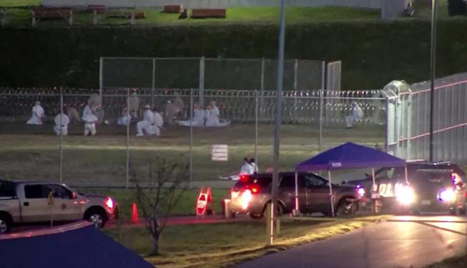 Reports say both housing units of the Monroe Correctional Complex were fully evacuated after order was restored. Images of the prison from Wednesday were circulating online and show dozens of inmates sitting outdoors.