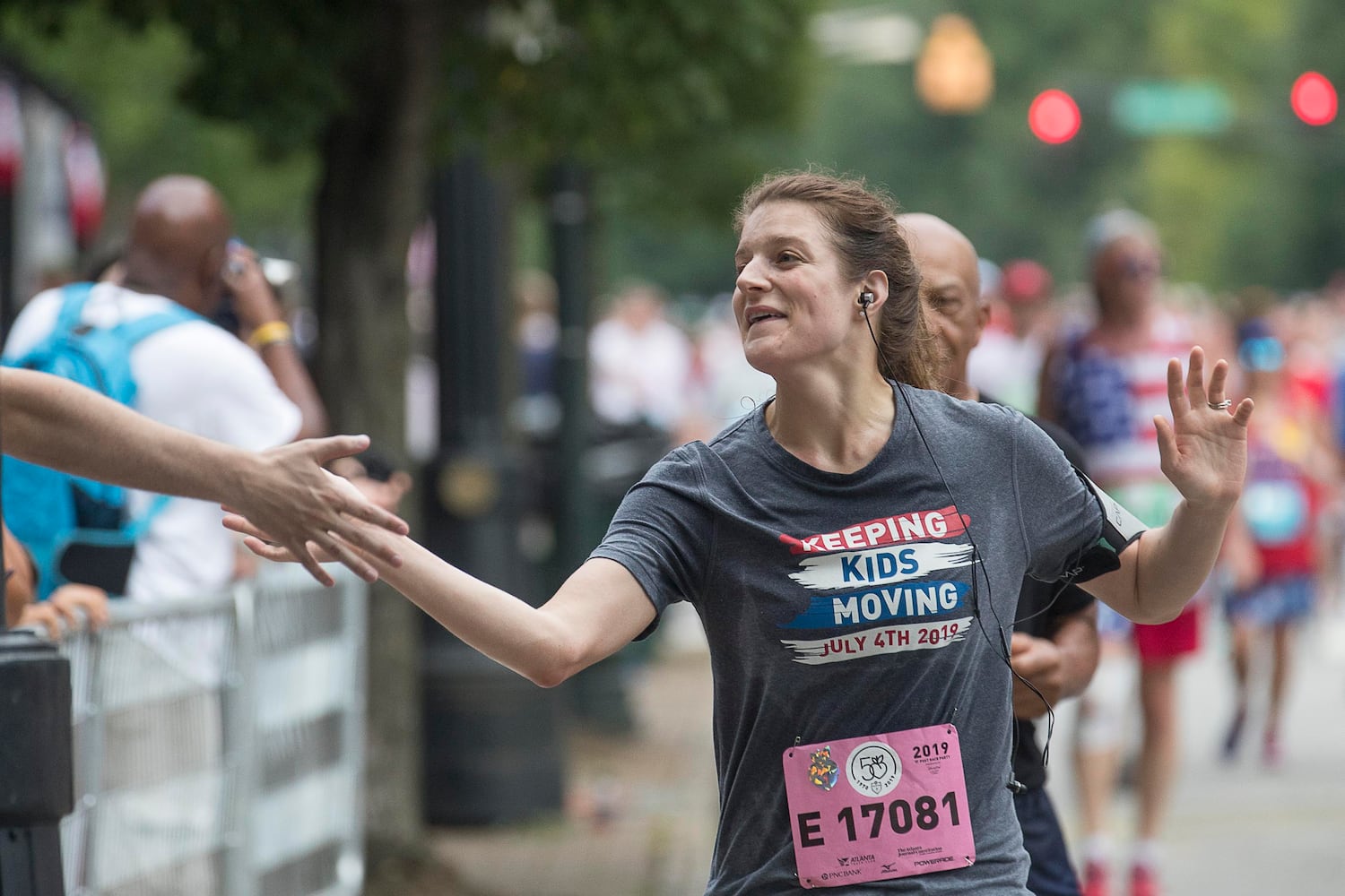 PHOTOS: Scenes at 2019 AJC Peachtree Road Race