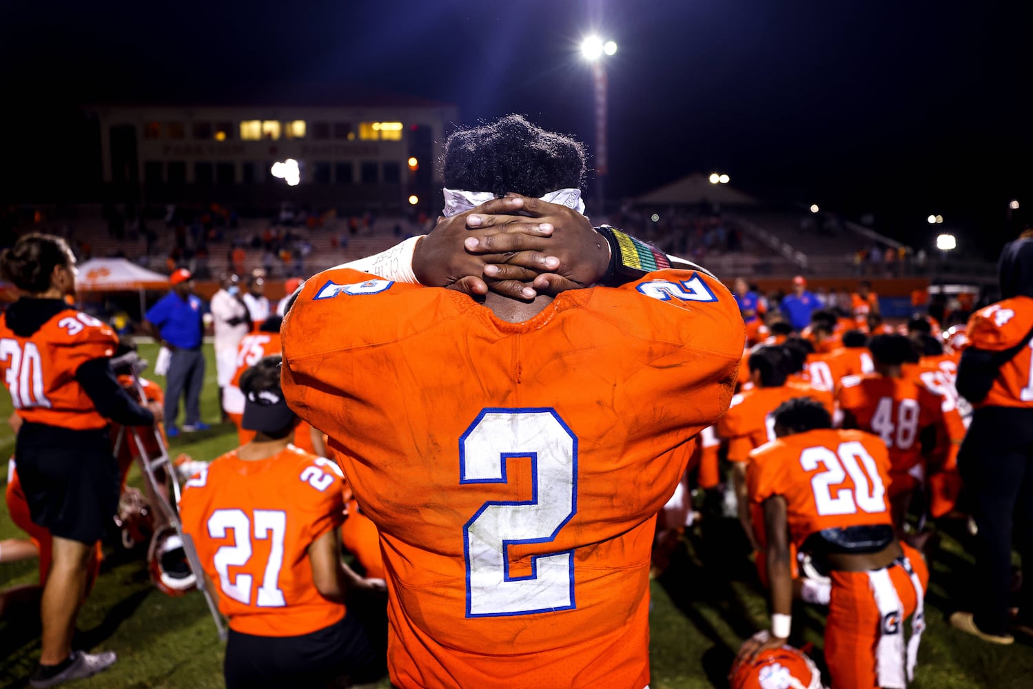 Parkview defensive back Champ Baker (2) stands in the back of the team huddle after the end of a GHSA 7A high school football game between the North Gwinnett Bulldogs and the Parkview Panthers at Parkview High School in Lilburn, Ga., on Friday, Sept. 3, 2021. North Gwinnett staged a late comeback and won 34-27 after trailing Parkview for most of the game. (Casey Sykes for The Atlanta Journal-Constitution)