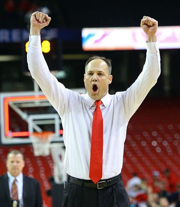 Georgia's Mark Fox exults after a difficult victory. (Curtis Compton/AJC)