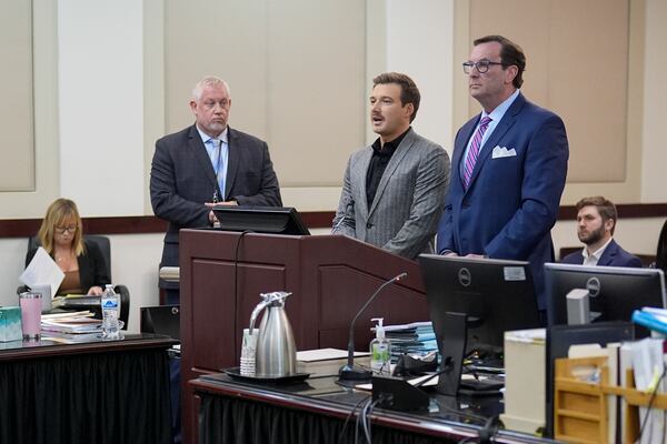 Morgan Wallen, second from right, pleas guilty to reckless endangerment charges related to throwing a chair off a six-story balcony in criminal court Thursday, Dec. 12, 2024, in Nashville, Tenn. (AP Photo/George Walker IV)