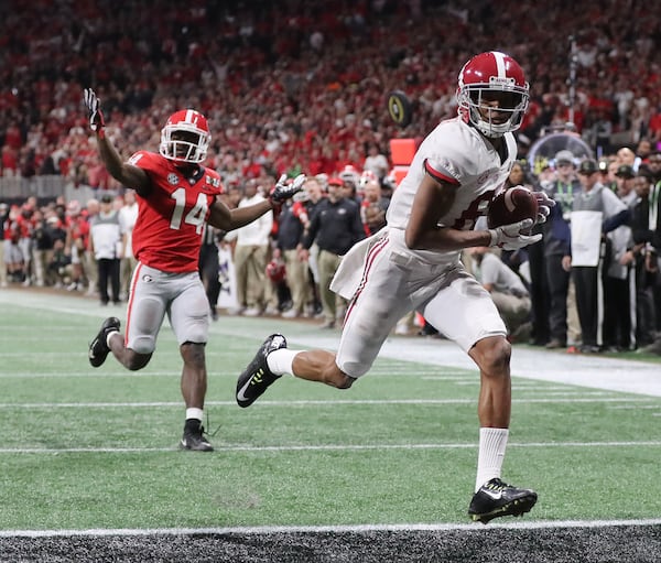 Alabama receiver Devonta Smith catches the winning touchdown during the 2018 College Football Playoff title game.