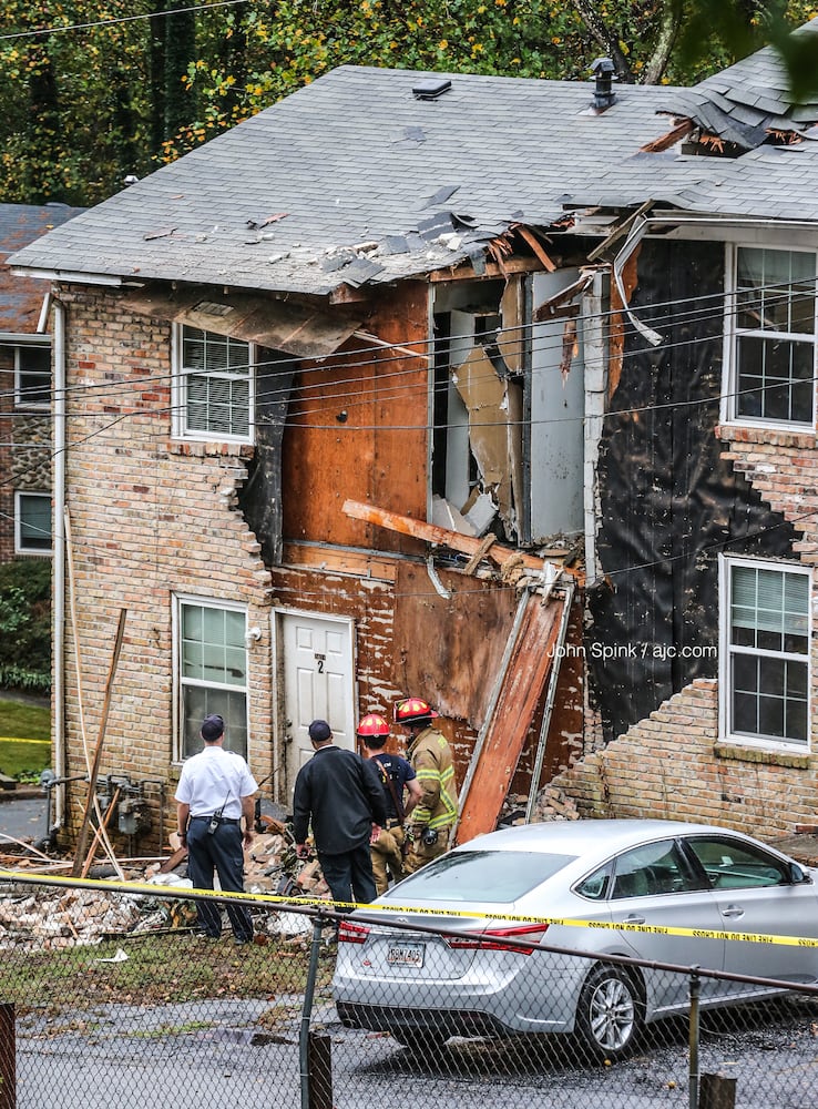 PHOTOS: Plane hits townhome complex in DeKalb County