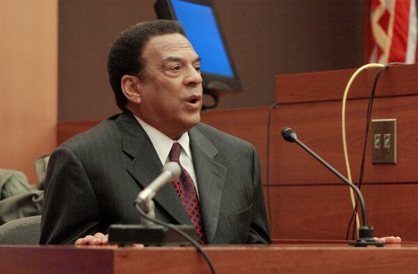 Former U.N. Ambassador and Atlanta Mayor Andrew Young testifies in the penalty phase of the Jamil Al-Amin murder trial in 2002 in Fulton County Superior Court. Young recounted getting to know Al-Amin in the 1980s when Young’s daughter moved to a West End neighborhood near Al-Amin’s store. (Kimberly Smith/AJC file photo)