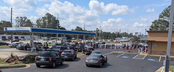 Cars and residents waited in lines for hours on Sunday, September 29, 2024, to get gas at a Chevron, one of the few stations in town with working pumps.