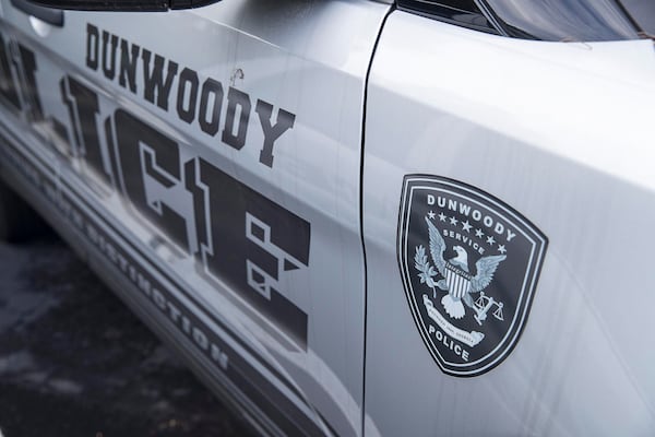 Dunwoody police cars are parked outside of the City of Dunwoody municipal building.  (Alyssa Pointer/alyssa.pointer@ajc.com)