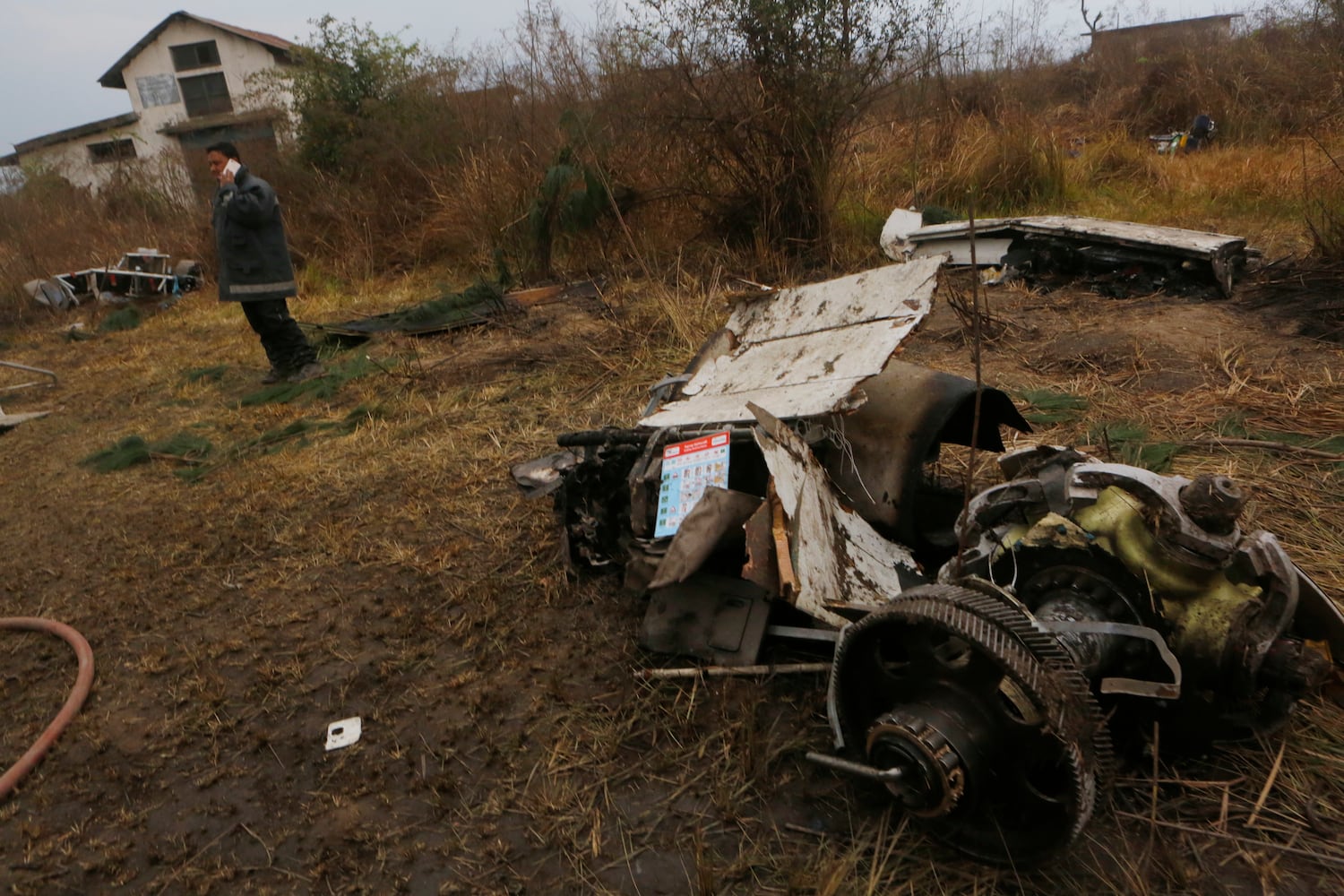 Photos: Kathmandu plane crash kills dozens, Nepal police say