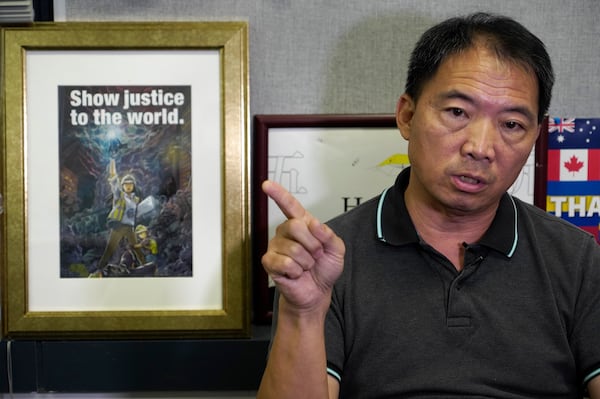 FILE - Pro-democracy lawmaker Wu Chi-wai gestures during an interview at his office in Legislative Council in Hong Kong on Nov. 19, 2020. (AP Photo/Vincent Yu, File)