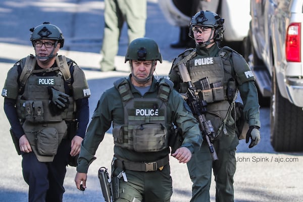 A SWAT team was on Cordite Loop in Snellville Monday morning. JOHN SPINK / JSPINK@AJC.COM