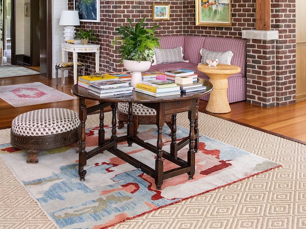 Think outside the box when it comes to incorporating "brown" into your home. A vintage dining table can become a foyer focal point, said designer Isabel Ladd.
Photo: Courtesy of Isabel Ladd Interiors / Katie Charlotte