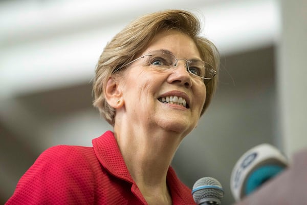 Democratic presidential candidate Elizabeth Warren will make a campaign stop in Gwinnett County on Feb. 16, 2019. The U.S. senator from Massachusetts is shown during a rally for Georgia gubernatorial candidate   Stacey Abrams back in October at Clayton State University in Morrow.  (Photo: ALYSSA POINTER/ALYSSA.POINTER@AJC.COM)