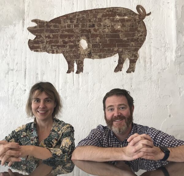 Chop Shop owners Rusty Bowers (right), Charlotte Swancy (left) and her husband Wes Swancy plan to open wine shop the Pour House in the building adjacent to their butchery and market. / LIGAYA FIGUERAS