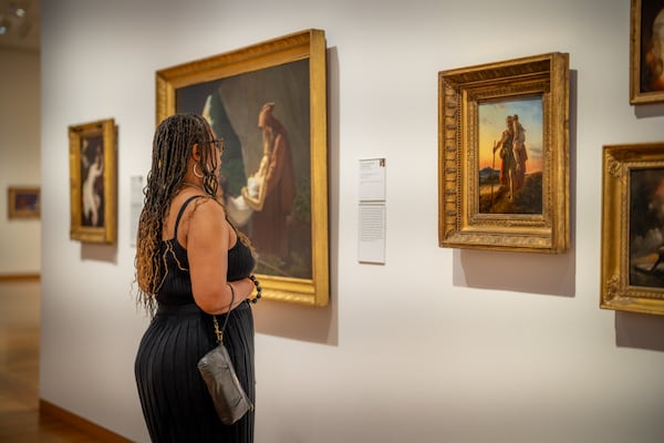 A guest contemplates a painting at the High Museum of Art. 
(Courtesy of the High Museum of Art / Rafterman)