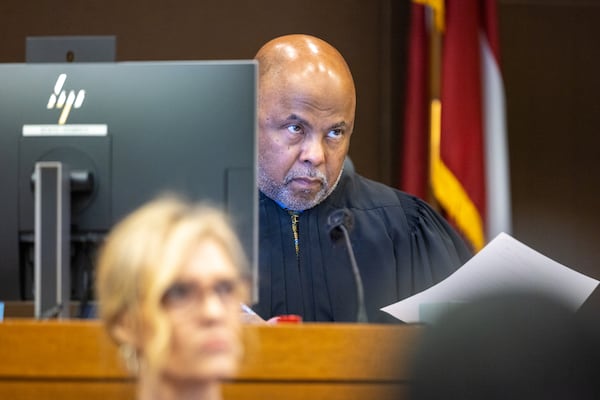 Judge Ural Glanville speaks to a juror during proceedings for the “Young Slime Life” gang trial in Atlanta on Monday, October 23, 2023. (Arvin Temkar / arvin.temkar@ajc.com)