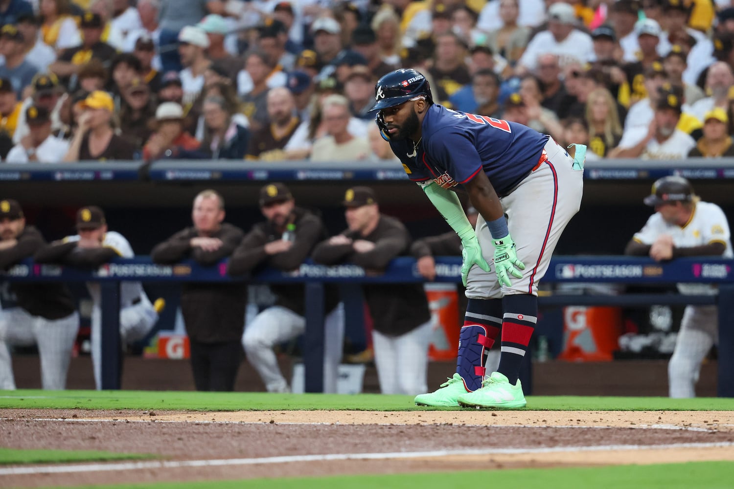 Atlanta Braves’ Michael Harris stretches after being hit with a foul tip against the San Diego Padres during the third inning of National League Division Series Wild Card Game Two at Petco Park in San Diego on Wednesday, Oct. 2, 2024.   (Jason Getz / Jason.Getz@ajc.com)