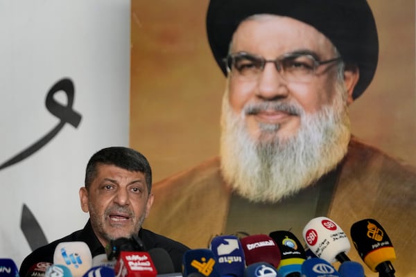 Hezbollah's chief spokesman Mohammed Afif speaks during a press conference in Dahiyeh, in the southern suburb of Beirut, Lebanon, Monday, Nov. 11, 2024. (AP Photo/Hussein Malla)