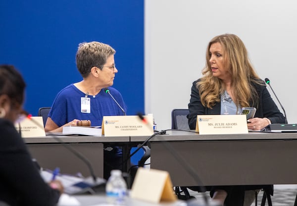 Members of the Fulton County Registration and Elections Board including Chairperson Cathy Woolard, left, and Julie Adams, board member, meet on Tuesday, June 18, 2024.  (Jenni Girtman for The Atlanta Journal-Constitution)