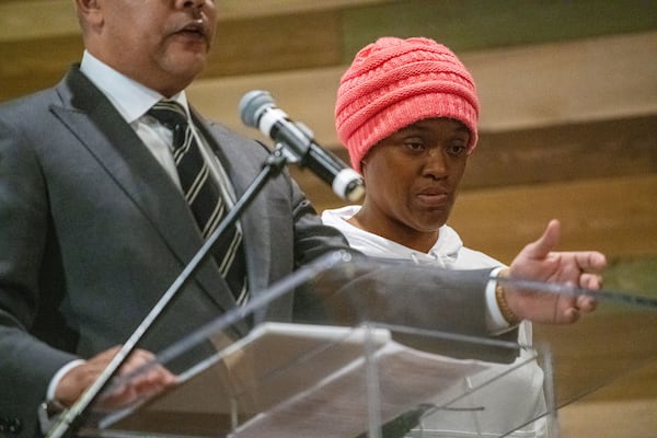 MARIETTA, Ga. -- From left, Attorney Timothy Gardner speaks for his client Tiffany Wingo at a town hall meeting to discuss the conditions at the Cobb County Detention Center Monday, Dec. 9, 2019 at Life Church in Marietta, Ga. Wingo’s brother, Kevil, died in the hospital after experiencing an unspecified medical emergency at the jail, which is still under investigation. PHOTO BY ELISSA BENZIE