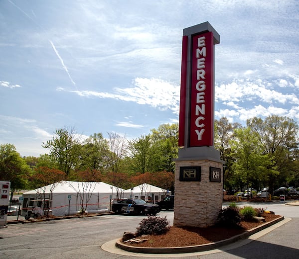 The newly constructed tents stand outside of Northside Hospitals’ Emergency Department are built in anticipation of a surge of COVID-19 patients. STEVE SCHAEFER / SPECIAL TO THE AJC