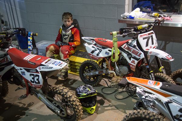 James Scheiman, 9, waits for his turn to race during the Supercross Amateur racing event at the Mercedes-Benz Stadium on Sunday, March 4, 2018. STEVE SCHAEFER / SPECIAL TO THE AJC