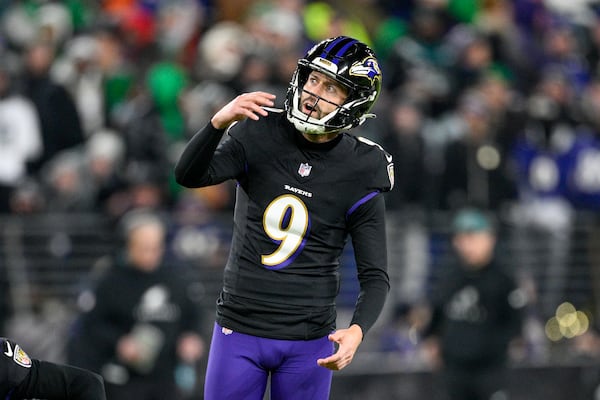 FILE - Baltimore Ravens kicker Justin Tucker watches his kick during the second half of an NFL football game against the Philadelphia Eagles, Dec. 1, 2024, in Baltimore. (AP Photo/Nick Wass, file)