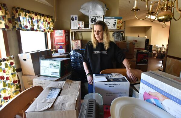 Mary Ann Statler packed in preparation for moving out her home, which was sold in foreclosure as she was battling for her Social Security benefit, on Wednesday, Dec. 13, 2017. HYOSUB SHIN / HSHIN@AJC.COM