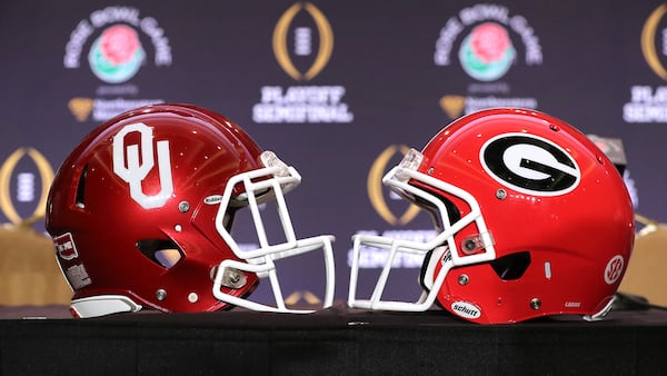 December 28, 2017 Los Angeles: The Georgia and Oklahoma helmets sit on a table during press conferences by the teams for the Rose Bowl Game on Thursday, December 28, 2017, in Los Angeles.    Curtis Compton/ccompton@ajc.com