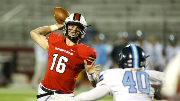 October 30, 2015 - Norcross, Ga: GAC quarterback Davis Mills (16) attempts a pass in the second half of their game against Lovett at Greater Atlanta Christian Friday in Norcross, Ga., October 30, 2015. GAC won 34-7. PHOTO / JASON GETZ GAC quarterback Davis Mills (16) attempts a pass in the second half of their game against Lovett at Greater Atlanta Christian Friday in Norcross, Ga., October 30, 2015. GAC won 34-7. (Jason Getz/AJC)