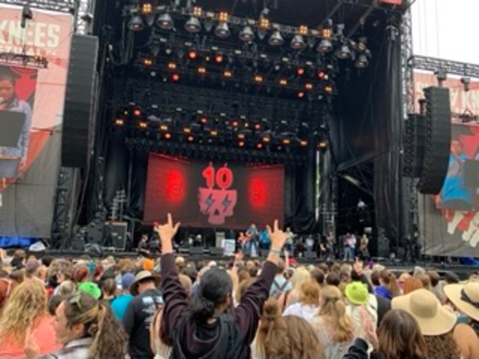 Attendees cheer for the Songs for Kids performers who opened up the Shaky Knees music festival on Friday, May 5, 2023. (Taylor Croft/taylor.croft@ajc.com)