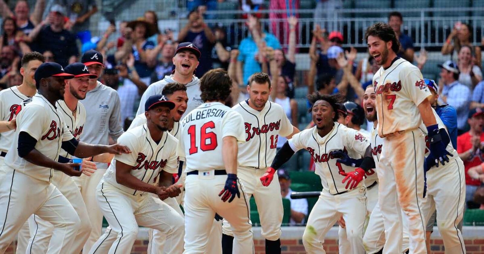 Teammates wait for Charlie Culberson to cross home plate on one of his two walk-off homers last week. 