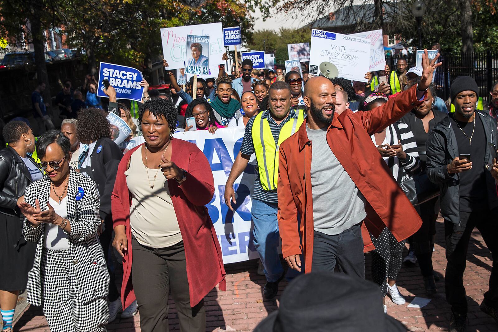 Former Georgia Gubernatorial candidate Stacey Abrams (second from left) was joined by Grammy Award-winning rapper Common (right of Abrams), Attorney Glenda Hatchet (left) and supporters as during a Souls to the Polls rally and march in downtown Atlanta on October 28, 2018. Common said this week that had he been asked to perform at the Super Bowl, he would have said no. (ALYSSA POINTER/ALYSSA.POINTER@AJC.COM)