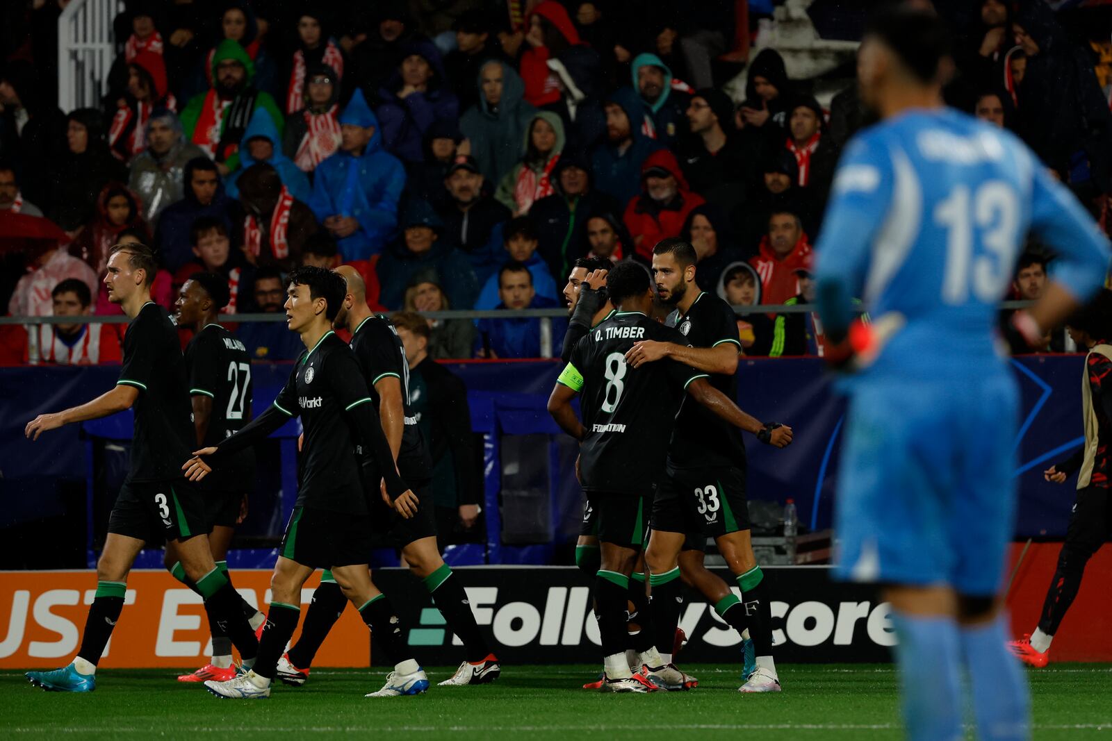 Feyenoord players celebrate after a goal during the Champions League soccer match between Girona and Feyenoord, in Girona, Spain, Wednesday, Oct. 2, 2024. (AP Photo/Joan Monfort)