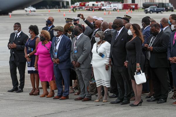 7/29/20 - Atlanta, GA - John Lewis’ family waits for his body to come off the plane.  On the fifth day of the “Celebration of Life” for Rep. John Lewis, Lewis’s body and family members returned to Georgia for ceremonies at the State Capitol where he will also lie in state until his funeral on Thursday.  Alyssa Pointer / alyssa.pointer@ajc.com