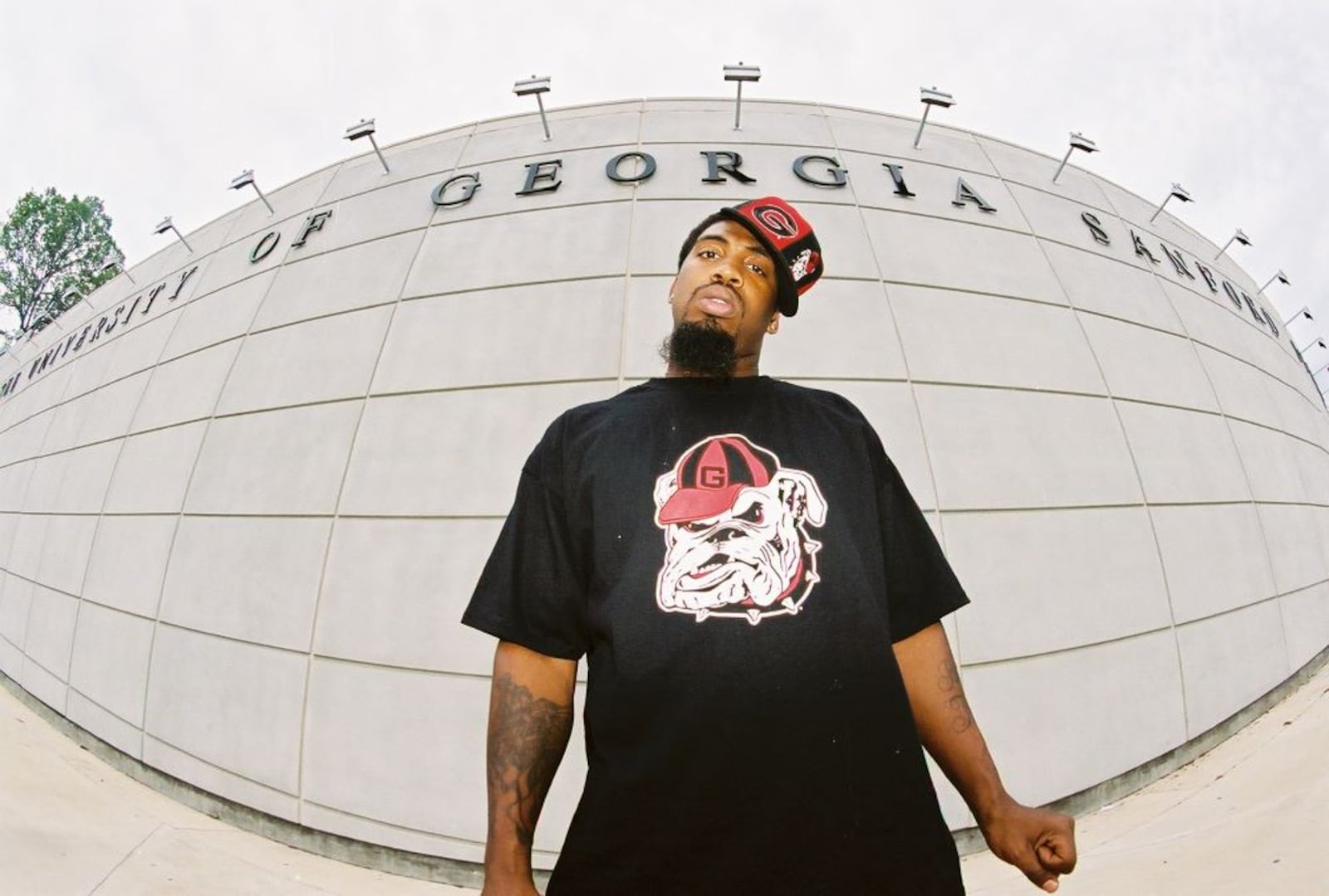 Georgia underground rapper Pastor Troy poses outside of Sanford Stadium at The University of Georgia in Athens.