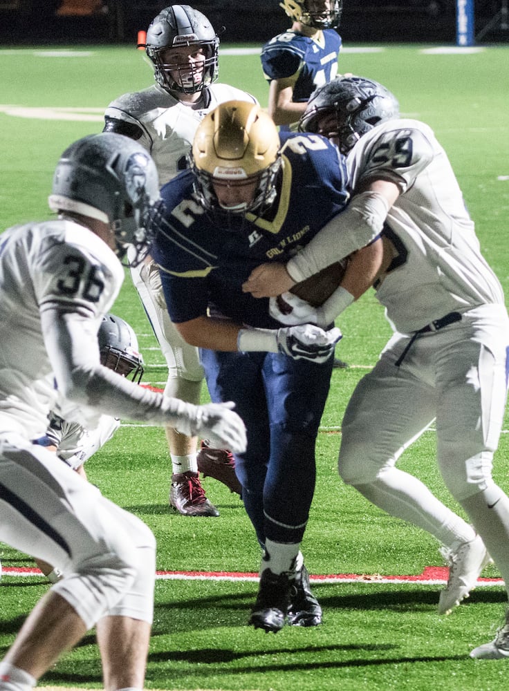 Photos: First round of high school football state playoffs