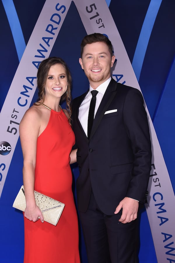  NASHVILLE, TN - NOVEMBER 08: Gabi Dugal and Singer Scotty McCreery attends the 51st annual CMA Awards at the Bridgestone Arena on November 8, 2017 in Nashville, Tennessee. (Photo by Michael Loccisano/Getty Images)