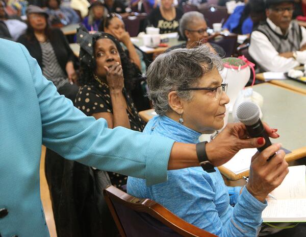 March 1, 2017, Lithonia: Concerned local seniors Linda Davis (left) and Dolores White both ask a question during a town hall discussing how repealing the Affordable Care Act could effect seniors, including changes to Medicare, at the Lou Walker Senior Center. Curtis Compton/ccompton@ajc.com