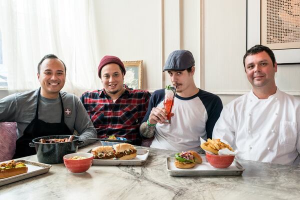  Hieu Pham (left), Eric Simpkins, Tyler Blackgrave, and Matt Floyd at Bon Ton. Photo credit- Mia Yakel.