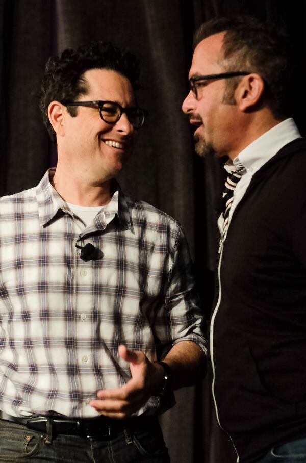 March 14, 2016 -  JJ Abrams, founder & president, Bad Robot Productions, left, and Andrew Jarecki, American film director & co-founder, Moviefone, right, make their way up towards the stage for a keynote address during South by Southwest Interactive held in Austin, Texas, on Monday, March 14, 2016. RODOLFO GONZALEZ / AUSTIN AMERICAN-STATESMAN